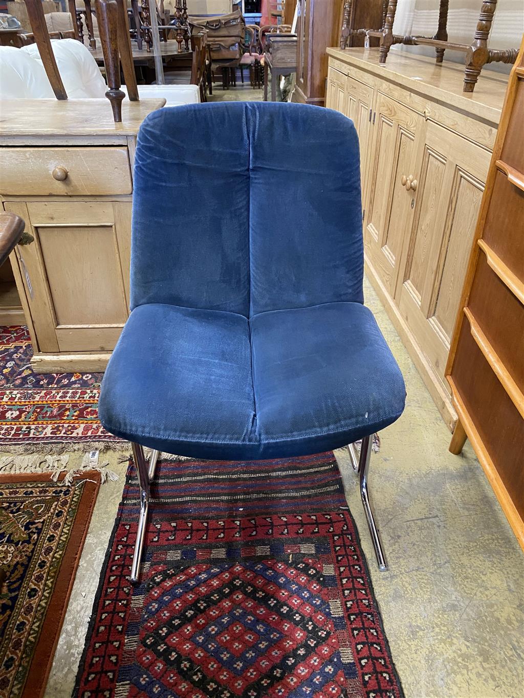 A set of four Pieff Eleganza blue fabric and chrome dining chairs